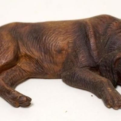 1138	ANTIQUE WOOD CARVING OF DOG W/GLASS EYES, RESTING, APPROXIMATELY 7 IN X 1 1/2 HIGH
