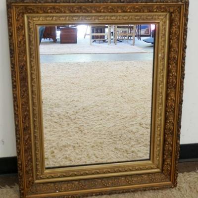 1126	ANTIQUE MIRROR IN ORNATE GESSO FRAME, APPROXIMATELY 27 IN X 33 IN
