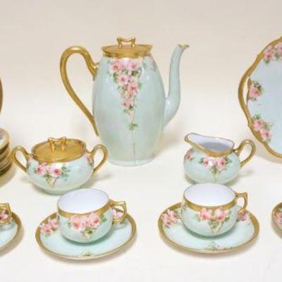 1052	ROSENTHAL FLORAL PAINT DECORATED TEA & CAKE SET, 6 CUPS & SAUCERS, TEAPOT, CREAMER & SUGAR, 11 IN SERVING TRAY & 6-8 1/2 IN PLATES
