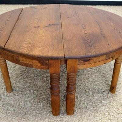1111	ROUND PINE COFFEE TABLE, APPROXIMATELY 43 IN X 18 IN HIGH
