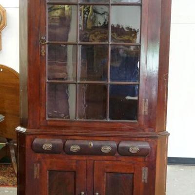 1083	ANTIQUE MAHOGANY 2 PART CORNER CUPBOARD W/12 INDIVIDUAL GLASS PANES, 1 DRAWER, APPROXIMATELY 42 IN WIDE X 22 IN DEEP X 87 IN HIGH
