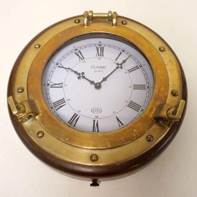 1137	BRASS & WOOD REPLICA OF SHIPS CLOCK, APPROXIMATELY 13 IN X 5 IN HIGH
