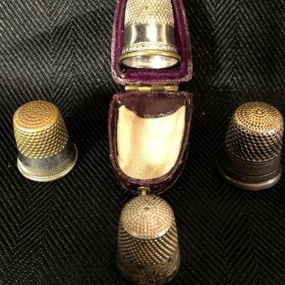 4 Thimbles, one sterling, one with case