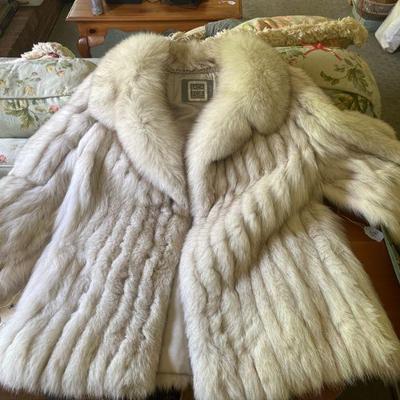 Saga Fox fur coat brightener and blue fox
