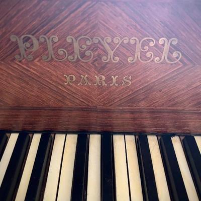 Antique c. 1900 Pleyel grand piano, brought over from France. (Pleyel was Chopinâ€™s preferred piano brand.)
