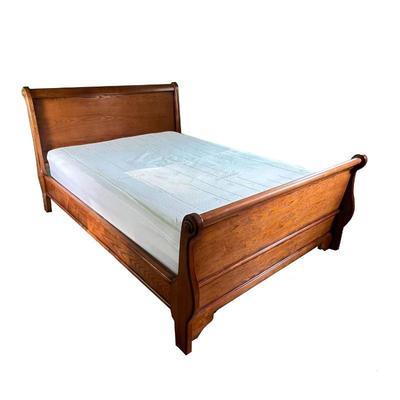 FULL-SIZE WOOD BED FRAME | Carved wood bed frame complete with headboard and footboard (most likely New Classic) and a like-new Beauty...