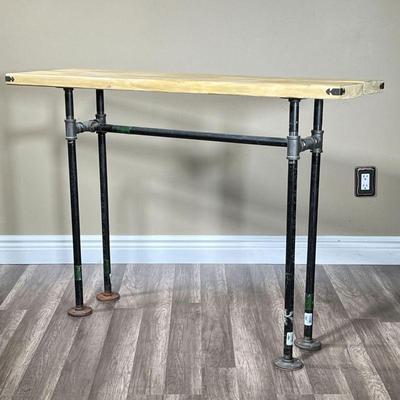 HANDMADE WOOD & IRON PIPE TABLE | Rustic work table made of 2 8x2s and supported by iron pipes. - l. 45 x w. 14.25 x h. 32.5 in
