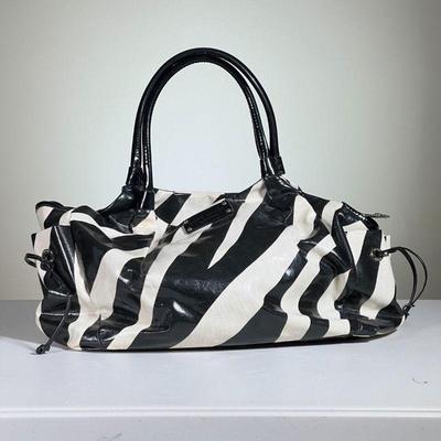 KATE SPADE BABY BAG | Black and white striped Kate Spade baby bag, lined with easy-to-clean material and several pockets, includes baby...
