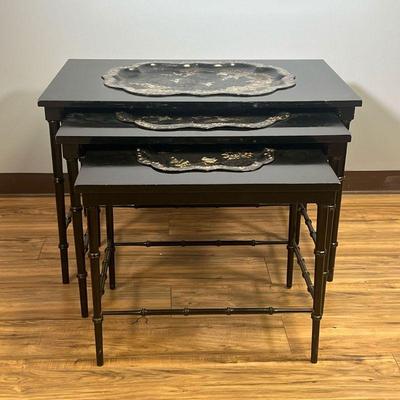 (3PC) NESTING TRAY TABLES | Black lacquered trays with mother-of-pearl inlay scenes, set into three black lacquered nesting tables with...