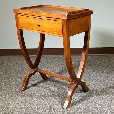 ANTIQUE SIDE TABLE | Wooden end table with a single drawer and 3/4 gallery top, over harp form supports. - l. 21 x w. 13 x h. 28 in