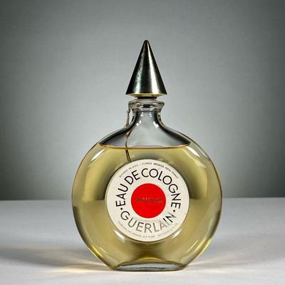 GUERLAIN SHALIMAR EAU DE COLOGNE | Round Guerlain bottle with a pointed cap. h. 7.5 in
