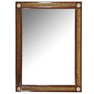 FRENCH STYLE WALL MIRROR | Wooden frame with inset brass decoration, having four painted porcelain plaques and wreath formed mounts. - w....