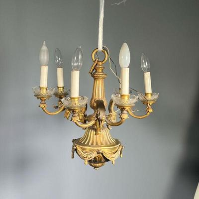 IMPORTANT DORE BRONZE CHANDELIER | Early 20th century, a French style gilt bronze chandelier chased with acanthus leaves, scrolls, reeded...