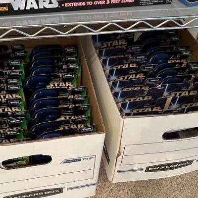 Boxes full of Star Wars Carded Action Figures - New in package