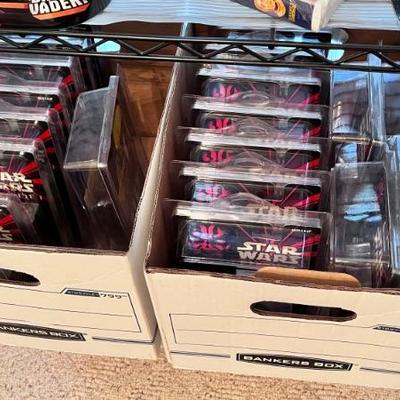 Boxes full of Star Wars Carded Action Figures - New in package