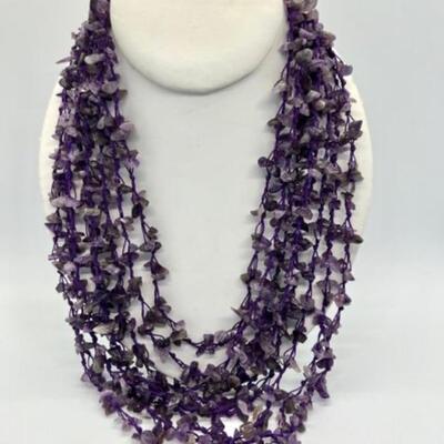#123 â€¢ Necklace of Eight Strands of Polished Amethyst Chip Beads
