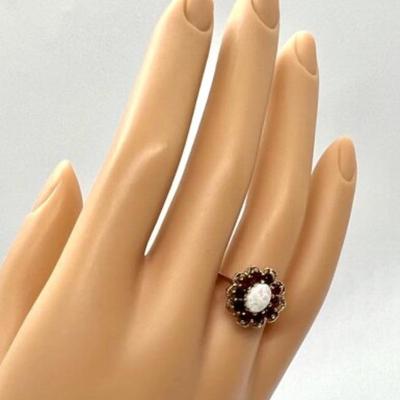 #93 â€¢ Vintage 10 K Gold Ring With Oval Opal And Halo of Ten Garnet Stones - Size 6.75
