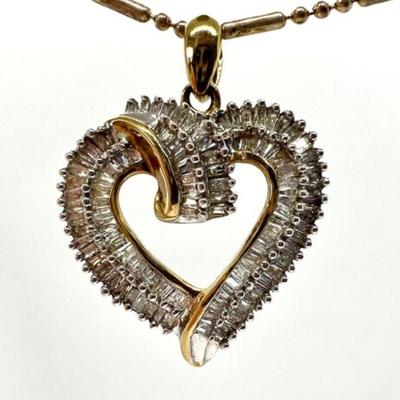 #112 â€¢ Diamond Heart Pendant w/ Many Baguette Diamonds in 10K Gold Setting
