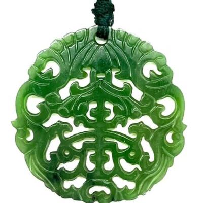 #82 â€¢ Gorgeous Carved Jade Pendant on Woven Cord
