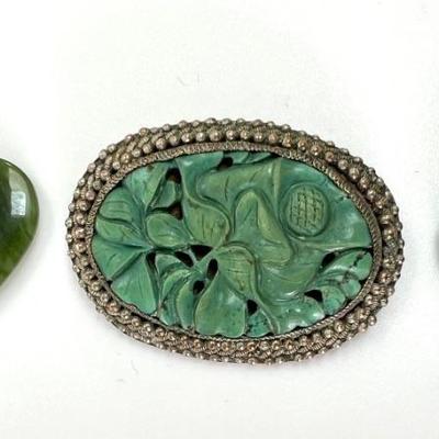 #140 â€¢ Two Carved Stone Pendants and One Asian Brooch
