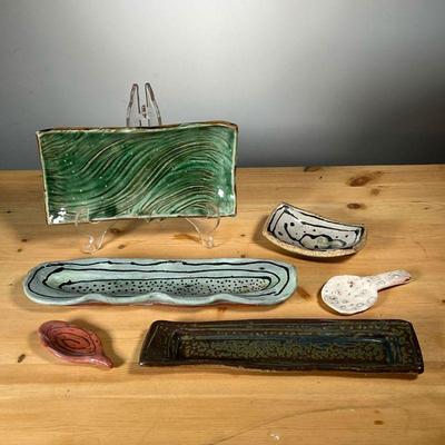 (6PC) MEG SMEAL POTTERY GROUP | Art pottery table items including pen trays and small dishes by Meg Smeal and other Potters. - l. 11.25...