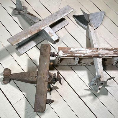 (3PC) FOLK ART WOODEN PLANES | (2) Wood Biplanes both with old paint. (1) Twin Engine Plane in old gray paint with damage to tail fin and...