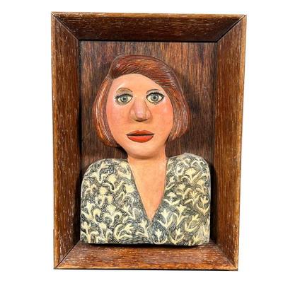 MEG SMEAL FRAMED BUST | Polychrome pottery bust of a woman, signed Meg Smeal; mounted into a wood frame. - l. 9.5 x w. 6.5 in (overall)