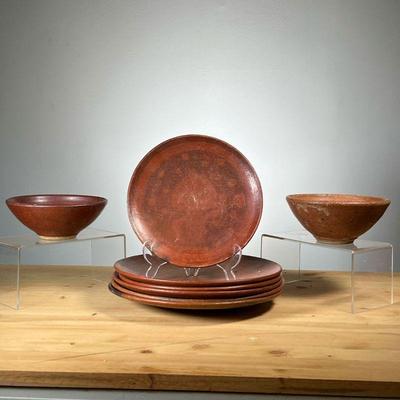 (8PC) BROWN POTTERY DISHES | Including five plates, a smaller plate, and two bowls Signed Ducvale, Nicaragua 2011 Meg Smeal. - dia. 11 in...