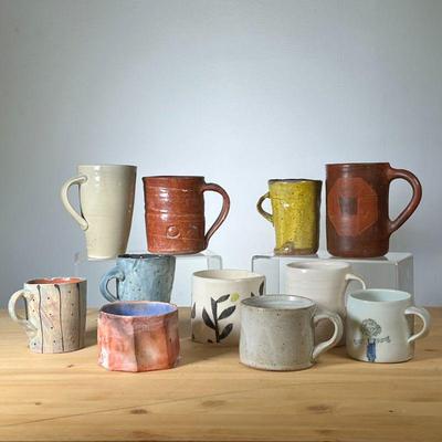 (11PC) MEG SMEAL ART POTTERY CUPS | Art pottery Mugs, cups. By Meg Smeal and other Potters. - h. 5 in (tallest)
