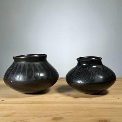 (2PC) SAN ILDEFONSO-STYLE BLACKWARE VESSELS | Two Native American black pottery, San Ildefonso style, pots with designs, apparently...