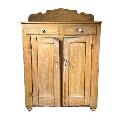 19TH C. GRAIN PAINTED CUPBOARD | 19th century Mustard Grain painted cupboard with two drawers over double cabinet doors before three...