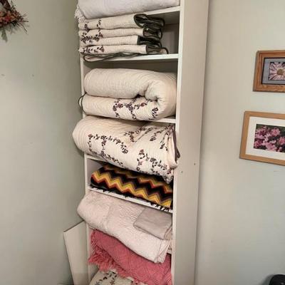 Vintage and contemporary quilts (some never used) and blankets