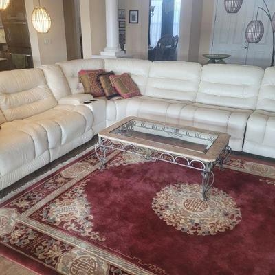 Very  large white leather sofa