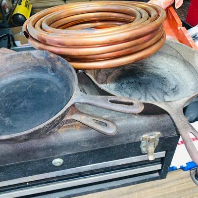 CAST IRON SKILLETS, COPPER TUBING, TOOL BOXES WITH SMALL HAND TOOLS