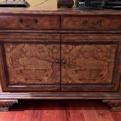 Entertainment/storage cabinet with world map detail