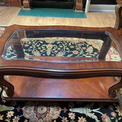 coffee table with glass insert and bottom shelf