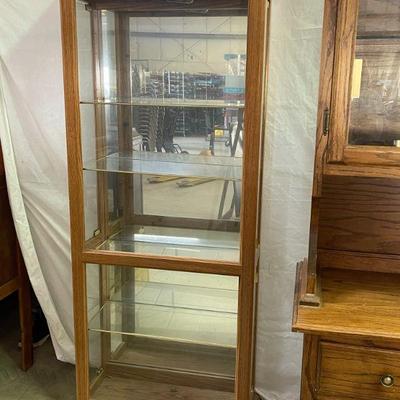 Curio with 4 glass shelves and lighted
