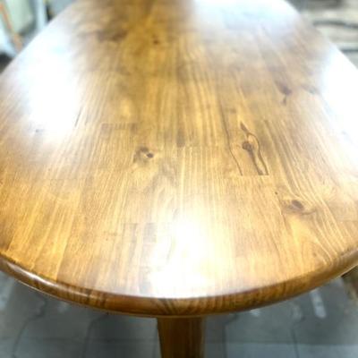 And I Dinning table. An oval-shaped tabletop of solid, amber-finished pine meets simplicity with impact. Thick bullnose edging and...