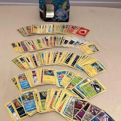 MTH062 Over 500 PokÃ©mon Trading Cards In Tin