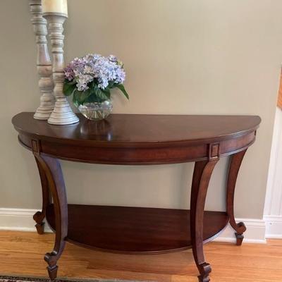 Half-moon shaped console table
