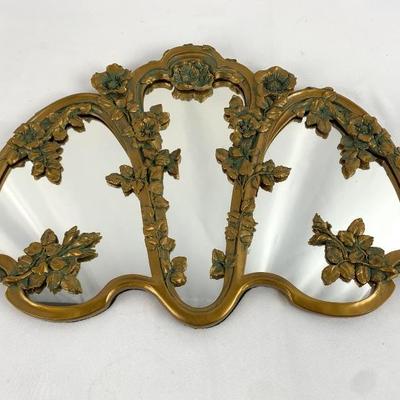 Ornate Vintage Mirror with Floral Metal Embellishments
