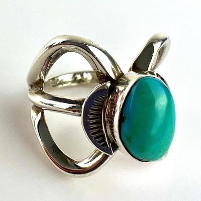 Oval Turquoise Cabochon Set in Arching Sterling Silver Ring Setting - Size 8