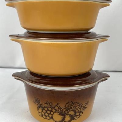 Set of Three Pyrex Dishes With Lids
