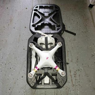 #2644 â€¢ DJI Phantom Professional Drone & Case Backpack
