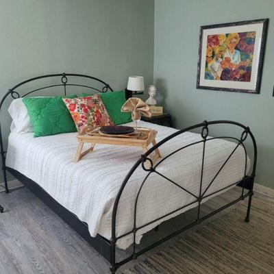 Queen bed with metal head and footboards