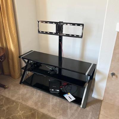 This item is available for PRESALE.  Please text photo to 760-668-0554 to purchase
Black Lacquer TV Stand with Attached Flat Screen Base...