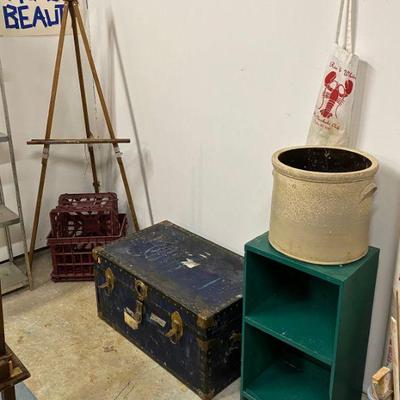 artist's easel, large crock, storage trunk, milk crates, 2 shelf unit