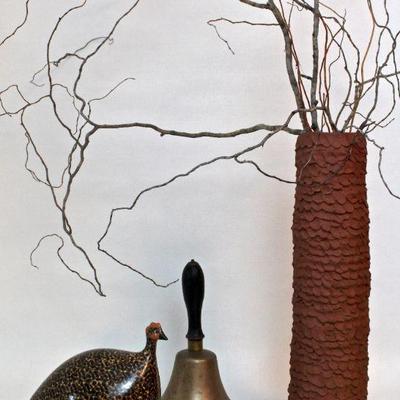 hand-built terra cotta vase by Ronny Waters, ceramic bird, antique brass bell
