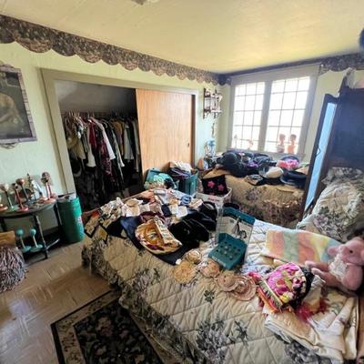 Vintage handbags, hats, clothes, fabrics and accessories fill this room and closet!