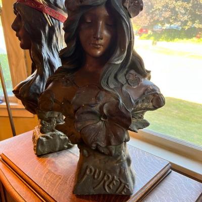 Antique statue of a young woman surrounded by flowers, titled, Purete, and attributed to Boston Plaster Art, appears to be made of...